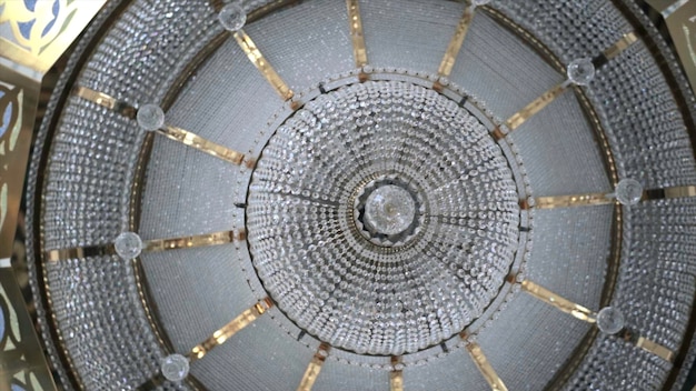 A highly detailed image of the Fermilab Muon g-2 ring, showing the intricate setup of superconducting magnets and detector systems, with muons depicted as tiny glowing particles swirling within the experimental apparatus, against a backdrop of a scientific laboratory.