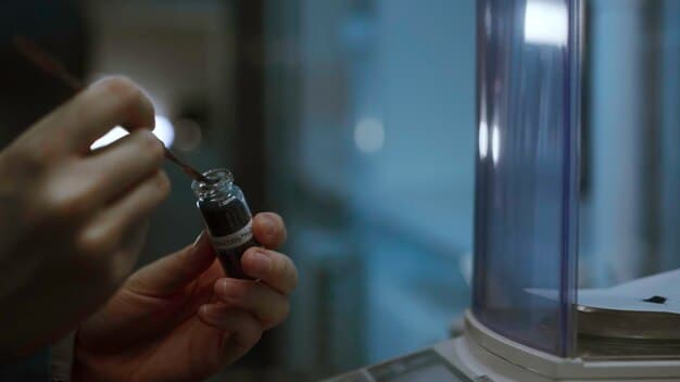 A close-up shot of a lunar sample return container being opened in a clean room facility on Earth, showing a scientists examining a rock sample under bright light.