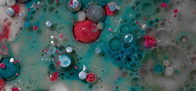 Microscopic image of various types of microplastics collected from a water sample in a US coastal area. The image shows different shapes, colors, and textures of the microplastics, highlighting the diversity of plastic pollution in marine environments related to The Impact of Microplastics on Marine Ecosystems: A Comprehensive Study of US Coastal Waters.