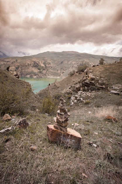 A depiction of the Monte Verde site in Chile, illustrating the well-preserved remains of pre-Clovis structures and artifacts. The image emphasizes the importance of this site in proving human habitation in the Americas thousands of years before the Clovis culture during New Discoveries in Paleoarcheology: What Fossil Finds Tell Us About the Earliest Humans in North America.
